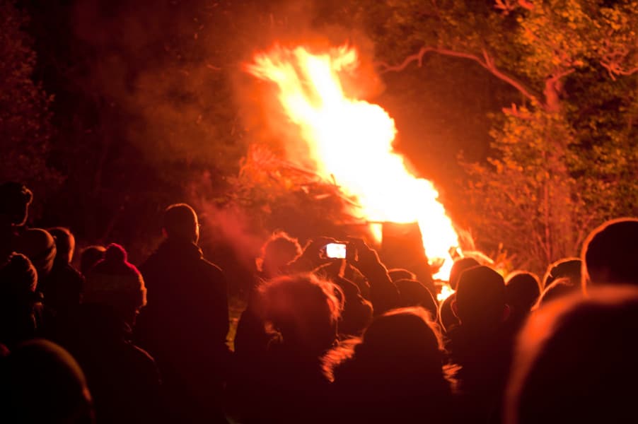 Crowd of people watching a bonfire on 5th November